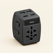 Black ALTAIR 65 W travel adaptor, front view